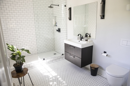A modern bathroom with modern and efficient features.